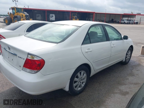 2005 Toyota Camry LE with VIN 4T1BF32K55U083752, listed as a IAAI auction lot 42145407 with 229,838 mi miles and . Bid and sale history available at DreamBid. Image 4.