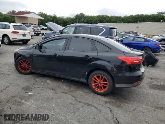 2016 Ford Focus SE with VIN 1FADP3F20GL303902, listed as a Copart auction lot 61374325 with 149,265 mi miles and Salvage title. Bid and sale history available at DreamBid. Image 2.