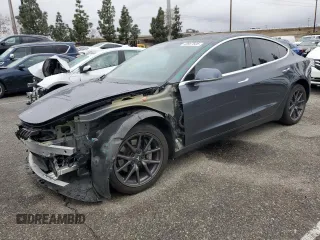 2019 Tesla Model 3 Mid Range with VIN 5YJ3E1EA9KF447453, listed as a Copart auction lot 48967605 with 72,031 mi miles and Salvage Title. Bid and sale history available at DreamBid. Image 1.