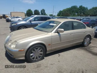 2000 Jaguar S-Type V6 z VIN SAJDA01C5YFL49303, wystawiony jako Copart lot #88096555 z przebiegiem 95 625 mil mil oraz Szkoda całkowita • Salvage title. Historia ofert i sprzedaży dostępna na DreamBid. Obrazek 1.