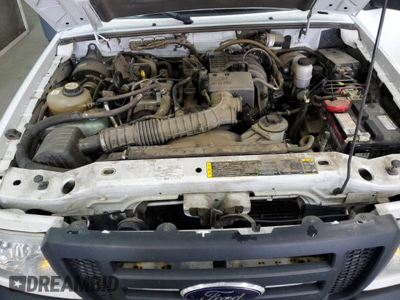2009 Ford Ranger XL with VIN 1FTYR10D99PA25405, listed as a Copart auction lot 51997415 with 70,553 mi miles and Salvage Title. Bid and sale history available at DreamBid. Image 11.