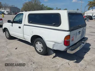 1998 Toyota Tacoma with VIN 4TANL42N2WZ022014, listed as a IAAI auction lot 41721566 with 175,566 mi miles. Bid and sale history available at carsss.com. Image 3.