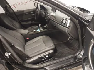 2018 BMW 3 Series 320i xDrive with VIN WBA8E5G5XJNU46855, listed as a IAAI auction lot 41526290 with 68,720 mi miles. Bid and sale history available at carsss.com. Image 5.