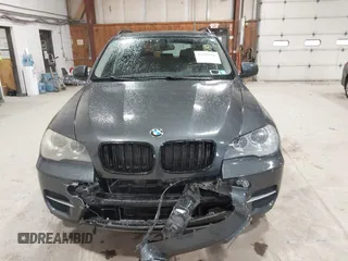 2012 BMW X5 35i z VIN 5UXZV4C59CL985715, wystawiony jako IAAI lot #42307586 z przebiegiem 105 147 mil mil oraz . Historia ofert i sprzedaży dostępna na DreamBid. Obrazek 12.