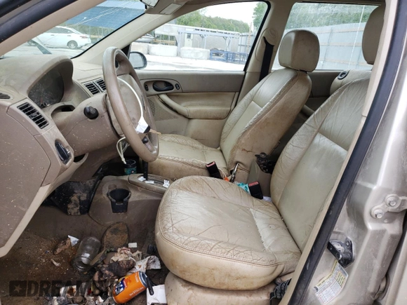2006 Ford Focus SE with VIN 1FAFP36N66W149227, listed as a Copart auction lot 56008385 with 226,599 mi miles and Salvage title. Bid and sale history available at DreamBid. Image 7.