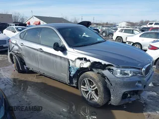 2018 BMW X6 xDrive50i with VIN 5UXKU6C50J0W39146, listed as a IAAI auction lot 41652073 with 108,258 mi miles. Bid and sale history available at carsss.com. Image 1.