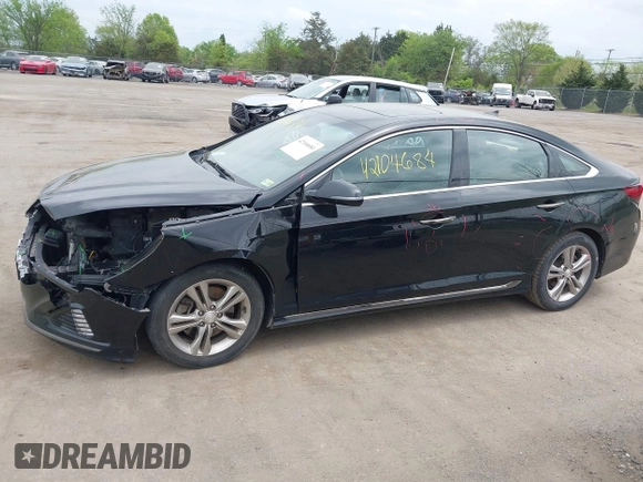 2018 Hyundai Sonata Sport with VIN 5NPE34AF0JH710477, listed as a IAAI auction lot 42104684 with 158,260 mi miles and . Bid and sale history available at carsss.com. Image 15.