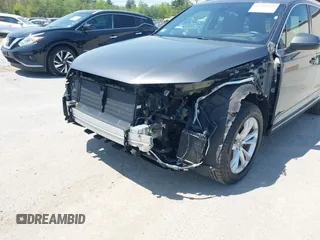 2018 Audi Q7 Premium Plus with VIN WA1LAAF70JD033878, listed as a IAAI auction lot 42203820 with 95,095 mi miles and . Bid and sale history available at DreamBid. Image 6.