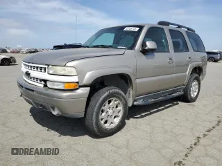 2003 Chevrolet Tahoe Z71 with VIN 1GNEK13T43R295137, listed as a Copart auction lot 52556745 with 292,288 mi miles and Salvage Title. Bid and sale history available at carsss.com. Image 1.