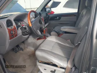 2006 GMC Envoy Denali with VIN 1GKES63MX62154590, listed as a IAAI auction lot 41439465 with 258,975 mi miles. Bid and sale history available at carsss.com. Image 5.