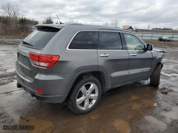 2012 Jeep Grand Cherokee Overland with VIN 1C4RJFCG3CC132303, listed as a Copart auction lot 47980335 with 113,598 mi miles and Salvage Title. Bid and sale history available at carsss.com. Image 3.