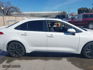 2024 Toyota Corolla Hybrid LE with VIN JTDBCMFE6RJ021033, listed as a IAAI auction lot 41624014 with 85,544 mi miles. Bid and sale history available at carsss.com. Image 13.