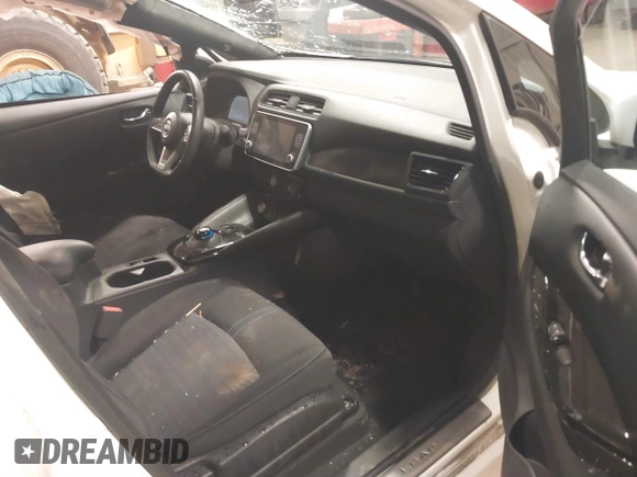 2023 Nissan LEAF SV Plus z VIN 1N4CZ1CV0PC563256, wystawiony jako IAAI lot #41138436 z przebiegiem 24 399 mil mil oraz . Historia ofert i sprzedaży dostępna na DreamBid. Obrazek 5.