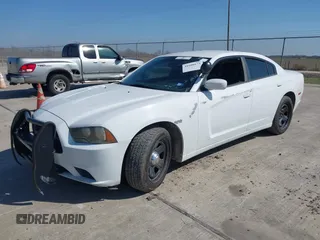 2012 Dodge Charger Police with VIN 2C3CDXAT6CH305817, listed as a IAAI auction lot 41608673 with 173,761 mi miles. Bid and sale history available at carsss.com. Image 2.