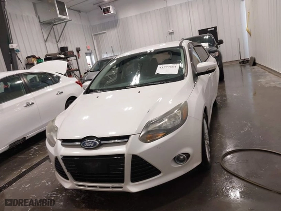 2012 Ford Focus Titanium with VIN 1FAHP3N26CL122364, listed as a IAAI auction lot 41777664 with NaN miles. Bid and sale history available at carsss.com. Image 12.