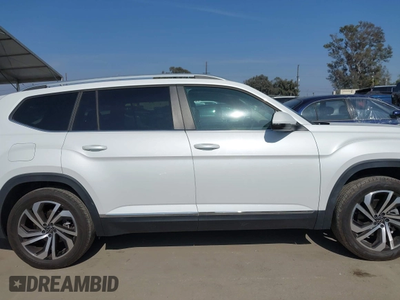 2023 Volkswagen Atlas SEL with VIN 1V2BR2CA7PC527099, listed as a IAAI auction lot 42099076 with 13,710 mi miles and . Bid and sale history available at DreamBid. Image 13.