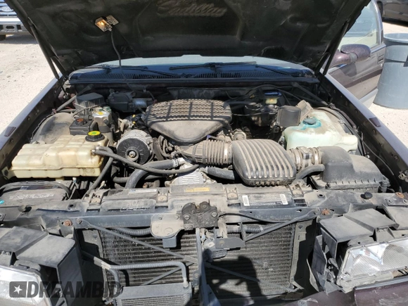 1995 Cadillac Fleetwood z VIN 1G6DW52P6SR702106, wystawiony jako Copart lot #48826215 z przebiegiem 140 971 mil mil oraz Szkoda całkowita • Salvage title. Historia ofert i sprzedaży dostępna na DreamBid. Obrazek 11.