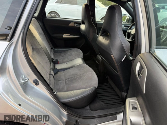 2009 Subaru WRX STI with VIN JF1GR89619L824570, listed as a Copart auction lot 65481115 with 169,078 mi miles and Clean title. Bid and sale history available at DreamBid. Image 6.