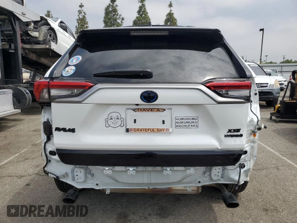 2024 Toyota RAV4 Hybrid XSE with VIN 4T3E6RFV0RU141591, listed as a Copart auction lot 59623085 with 27,682 mi miles and Salvage title. Bid and sale history available at DreamBid. Image 6.