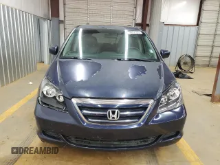 2005 Honda Odyssey EX-L with VIN 5FNRL38785B054186, listed as a Copart auction lot 58072125 with 219,928 mi miles and Salvage title. Bid and sale history available at DreamBid. Image 5.