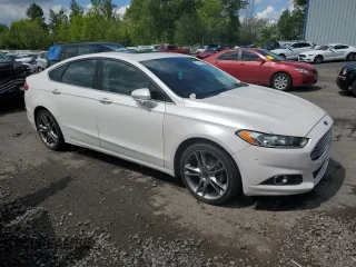 2016 Ford Fusion Titanium with VIN 3FA6P0K9XGR240562, listed as a Copart auction lot 55151285 with 119,950 mi miles and Clean Title. Bid and sale history available at DreamBid. Image 4.