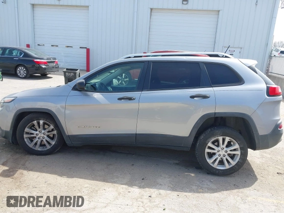 2015 Jeep Cherokee Sport with VIN 1C4PJLAB2FW696010, listed as a IAAI auction lot 42032956 with 88,323 mi miles. Bid and sale history available at carsss.com. Image 14.