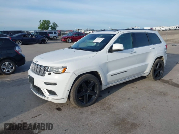 2018 Jeep Grand Cherokee Summit with VIN 1C4RJFJG0JC107732, listed as a IAAI auction lot 42328645 with 109,601 mi miles and . Bid and sale history available at DreamBid. Image 18.