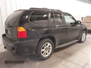 2006 GMC Envoy Denali with VIN 1GKET63M662310282, listed as a IAAI auction lot 41367523 with 216,451 mi miles. Bid and sale history available at carsss.com. Image 4.