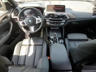 2021 BMW X4 xDrive30i with VIN 5UX2V1C09M9E03411, listed as a Copart auction lot 62078545 with 49,101 mi miles and Salvage title. Bid and sale history available at DreamBid. Image 8.