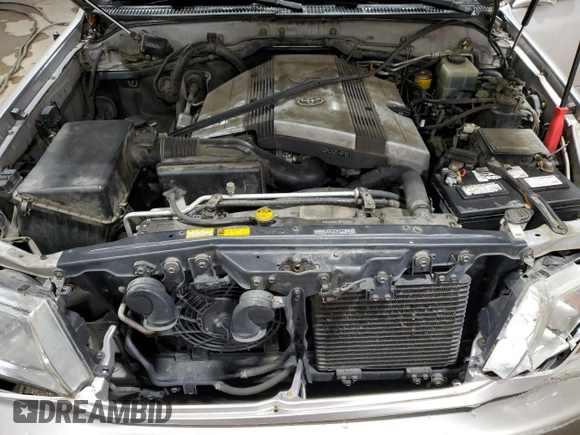 2000 Toyota Land Cruiser with VIN JT3HT05JXY0093444, listed as a Copart auction lot 86171724 with 273,194 mi miles and Salvage Title. Bid and sale history available at carsss.com. Image 12.