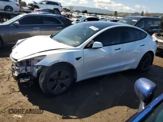 2023 Tesla Model 3 with VIN 5YJ3E1EA9PF558527, listed as a Copart auction lot 48754535 with 21,801 mi miles and Salvage Title. Bid and sale history available at DreamBid. Image 1.