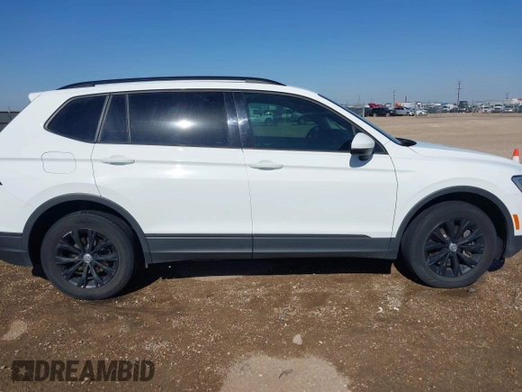 2018 Volkswagen Tiguan S with VIN 3VV0B7AX8JM076693, listed as a IAAI auction lot 42044886 with 109,660 mi miles and . Bid and sale history available at DreamBid. Image 13.