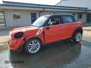 2012 MINI Countryman with VIN WMWZB3C56CWM05112, listed as a Copart auction lot 63187785 with 72,952 mi miles and Salvage title. Bid and sale history available at DreamBid. Image 1.