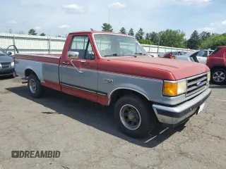 1990 Ford F-150 with VIN 1FTDF15NXLNA61972, listed as a Copart auction lot 60354815 with 21,243 mi miles and Clean title. Bid and sale history available at DreamBid. Image 4.