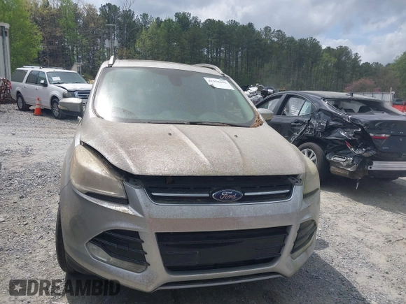 2015 Ford Escape Titanium with VIN 1FMCU0J98FUA87044, listed as a IAAI auction lot 41952096 with 257,437 mi miles. Bid and sale history available at carsss.com. Image 12.