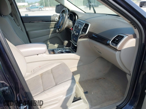 2011 Jeep Grand Cherokee Laredo with VIN 1J4RR4GG5BC622628, listed as a IAAI auction lot 42402893 with 163,731 mi miles and . Bid and sale history available at DreamBid. Image 5.