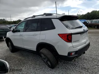 2023 Honda Passport EX-L with VIN 5FNYF8H58PB015048, listed as a Copart auction lot 66259043 with 7,142 mi miles. Bid and sale history available at carsss.com. Image 2.