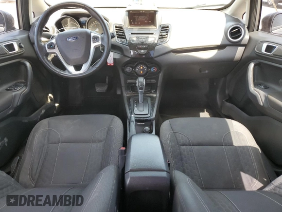 2014 Ford Fiesta SE z VIN 3FADP4BJ4EM110277, wystawiony jako Copart lot #56921115 z przebiegiem 126 536 mil mil oraz Szkoda całkowita • Salvage title. Historia ofert i sprzedaży dostępna na DreamBid. Obrazek 8.