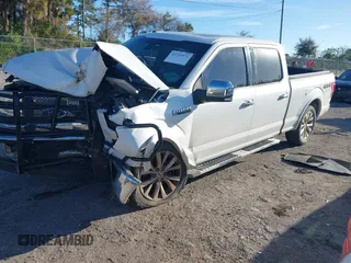 2016 Ford F-150 XLT with VIN 1FTFW1EF4GFA70555, listed as a IAAI auction lot 41733971 with 218,209 mi miles. Bid and sale history available at carsss.com. Image 2.