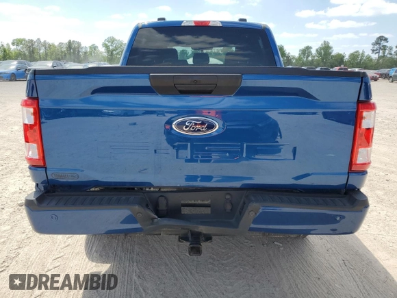 2023 Ford F-150 XL with VIN 1FTFW1E51PKF30933, listed as a Copart auction lot 53256355 with 26,267 mi miles and Salvage Title. Bid and sale history available at carsss.com. Image 6.