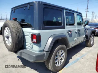 2023 Jeep Wrangler Sport S with VIN 1C4HJXDG5PW623797, listed as a Copart auction lot 66359625 with 16,518 mi miles and Salvage title. Bid and sale history available at DreamBid. Image 3.