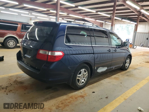 2005 Honda Odyssey EX-L with VIN 5FNRL38785B054186, listed as a Copart auction lot 58072125 with 219,928 mi miles and Salvage title. Bid and sale history available at DreamBid. Image 3.