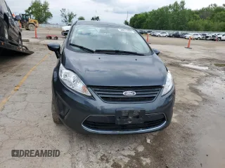 2011 Ford Fiesta S с VIN 3FADP4AJ3BM166904, выставлен на аукционе Copart как лот 58821805 с пробегом 30 981 миль миль и Списание • Salvage title. История ставок и продаж доступна на DreamBid. Изображение 5.