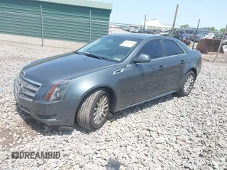 2011 Cadillac CTS with VIN 1G6DC5EY0B0163841, listed as a IAAI auction lot 42409886 with 119,231 mi miles and . Bid and sale history available at DreamBid. Image 2.