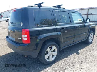 2016 Jeep Patriot High Altitude with VIN 1C4NJRFB5GD718548, listed as a IAAI auction lot 42162649 with 122,235 mi miles and . Bid and sale history available at carsss.com. Image 4.