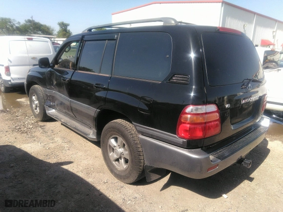 2001 Toyota Land Cruiser with VIN JTEHT05J512016563, listed as a IAAI auction lot 41868193 with 247,653 mi miles. Bid and sale history available at carsss.com. Image 3.