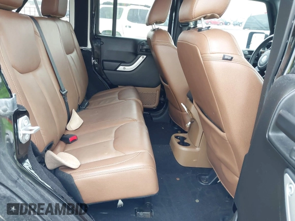 2017 Jeep Wrangler Unlimited Rubicon Recon z VIN 1C4HJWFG9HL592824, wystawiony jako IAAI lot #41427433 z przebiegiem 70 105 mil mil oraz . Historia ofert i sprzedaży dostępna na DreamBid. Obrazek 8.