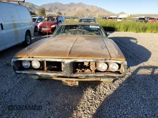 1974 Dodge Charger z VIN WH23G4G119455, wystawiony jako Copart lot #57183165 z przebiegiem 79 597 mil mil oraz Szkoda całkowita • Salvage title. Historia ofert i sprzedaży dostępna na DreamBid. Obrazek 5.