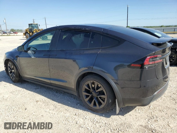2023 Tesla Model X with VIN 7SAXCDE5XPF422163, listed as a Copart auction lot 52573185 with Not Provided miles and Salvage Title. Bid and sale history available at DreamBid. Image 2.