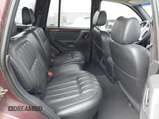 2000 Jeep Grand Cherokee Limited with VIN 1J4GW58N4YC423095, listed as a IAAI auction lot 42275933 with 135,684 mi miles and . Bid and sale history available at DreamBid. Image 8.